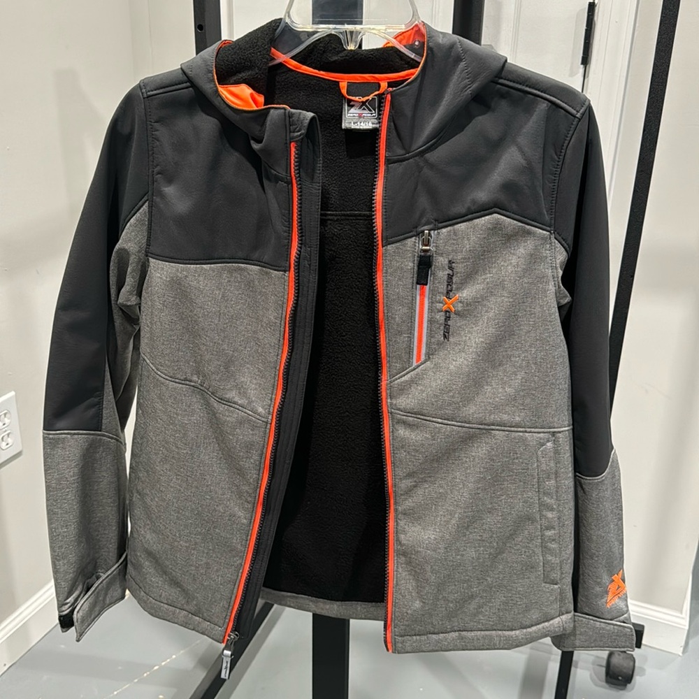 Boys waterproof fleece lined jacket size 14/16